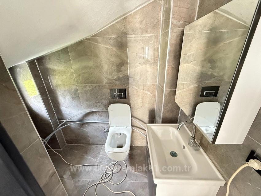 Freistehende Villa Mit 3+1 Schlafzimmern Und Brandneuem Garten In Seferihisar Doğanbey Zu Verkaufen