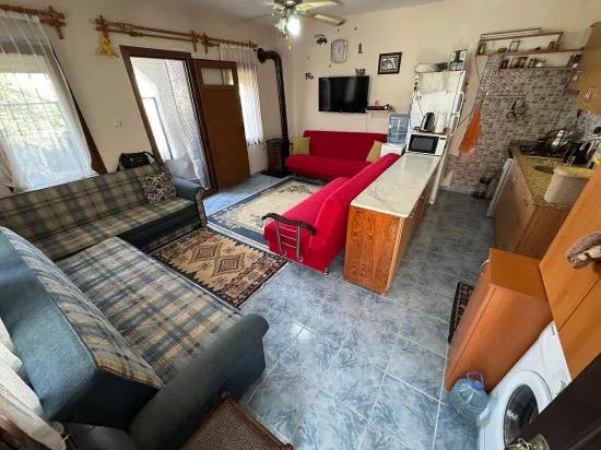 In Doğanbey Einem Zu-verkauf-stehenden Zwischen-geschoss 2+1 Zur Meer-seite 70 Metre² Wohnung