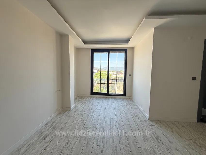 1+1 Bedroom Apartment For Sale in Cumhuriyet Nbh. Seferihisar Doğanbey - 60 m²
