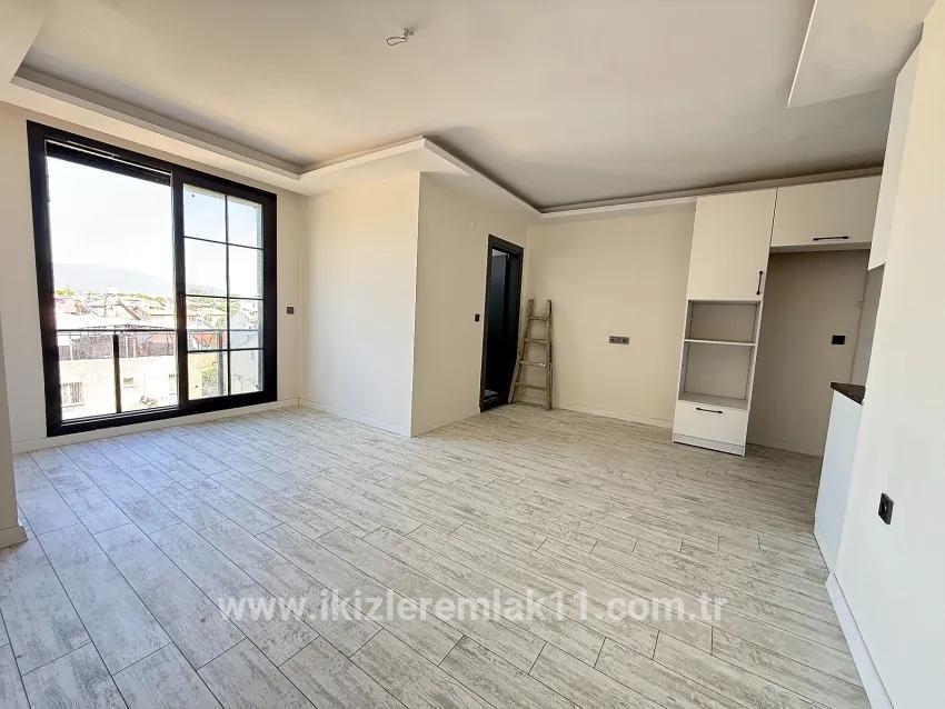1+1 Bedroom Apartment For sale in Cumhuriyet Nbh. Seferihisar Doğanbey - 60 m²