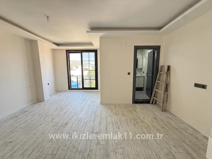 1+1 Bedroom Apartment For sale in Cumhuriyet Nbh. Seferihisar Doğanbey - 60 m²