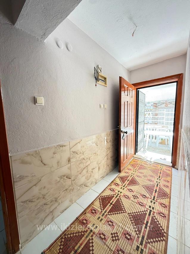 3+1 Garden Apartment For Sale In Ürkmez, 250 Meters From The Sea, Affordable Price