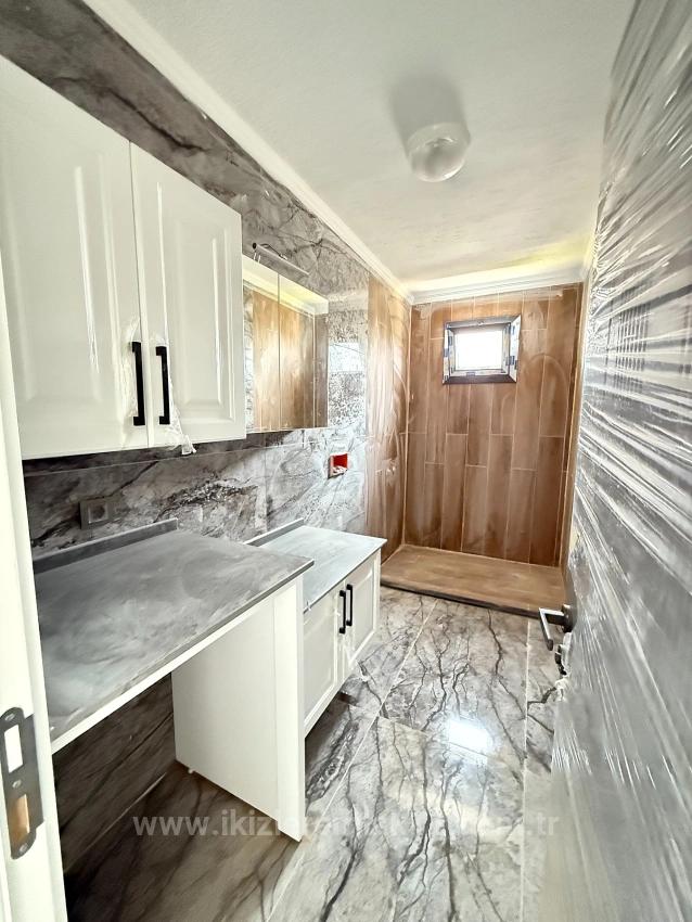 3+1 Villa With Sea View And Garden For Sale In Seferihisar Doğanbey