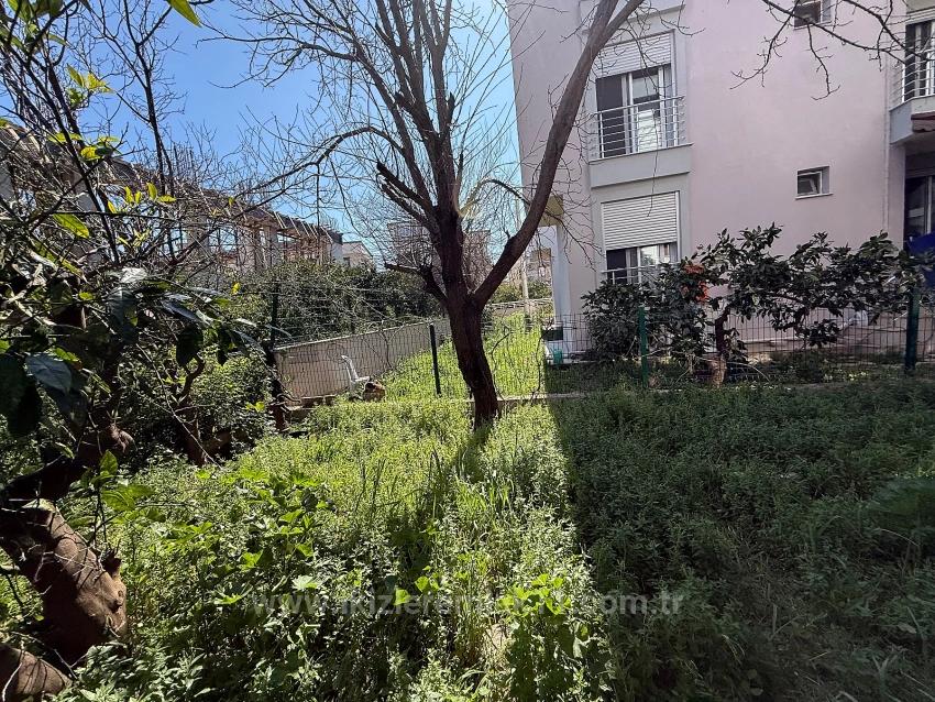 Ground Floor 2+1 Apartment With Garden For Sale In Seferihisar Ürkmez Center.