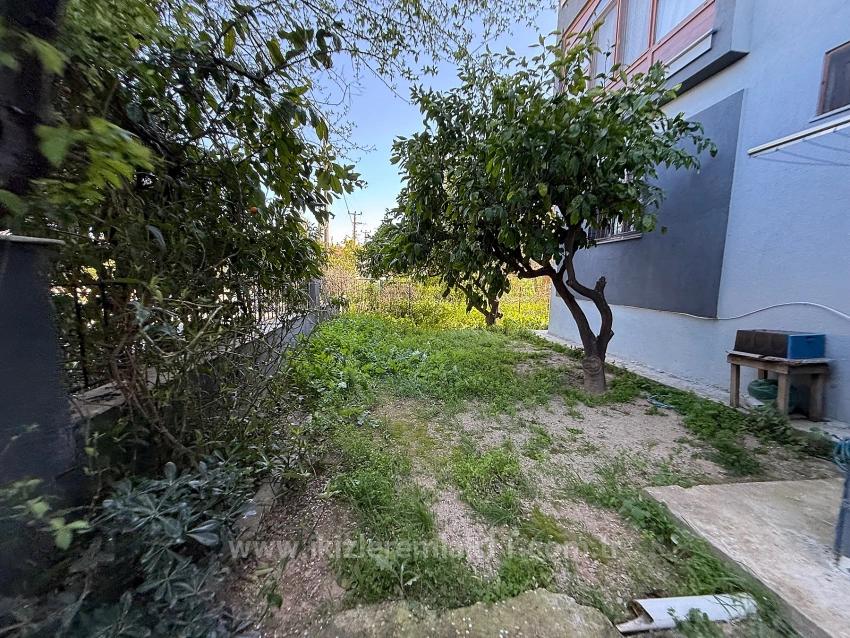Ground Floor 2+1 Apartment With Garden For Sale In Seferihisar Ürkmez Center.