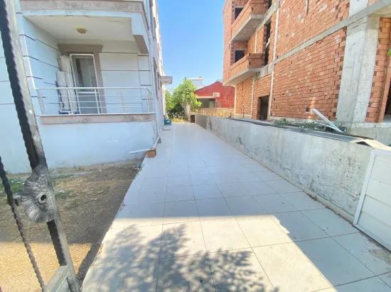 In Ürkmez Center ground floor 2+1 full furnished apartment