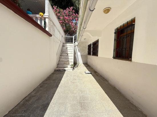 3+1 Garden Apartment For Sale In Ürkmez, 250 Meters From The Sea, Affordable Price