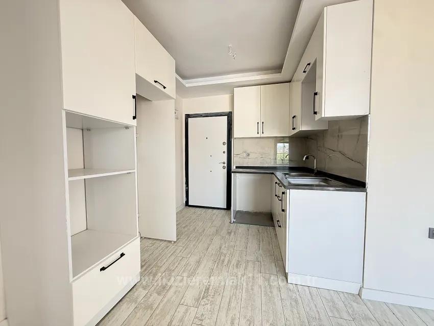 В Сеферихисаре Doğanbey Продается 1+1 Квартира На Стороне Моря Продается Квартира
