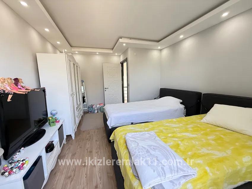 В Ürkmez Doğanbey отдельный бассейн 3+1 с отдельной кухней широкий сад