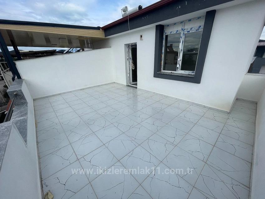 Роскошная Вилла 3+1 На Продажу В Районе Сеферихисар-Доганбей, Просторное Место, Очень Близко К Морю