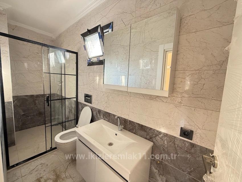 Двухуровневая Вилла 3+1 С Новым Садом На Продажу В Сеферихисар Доганбей