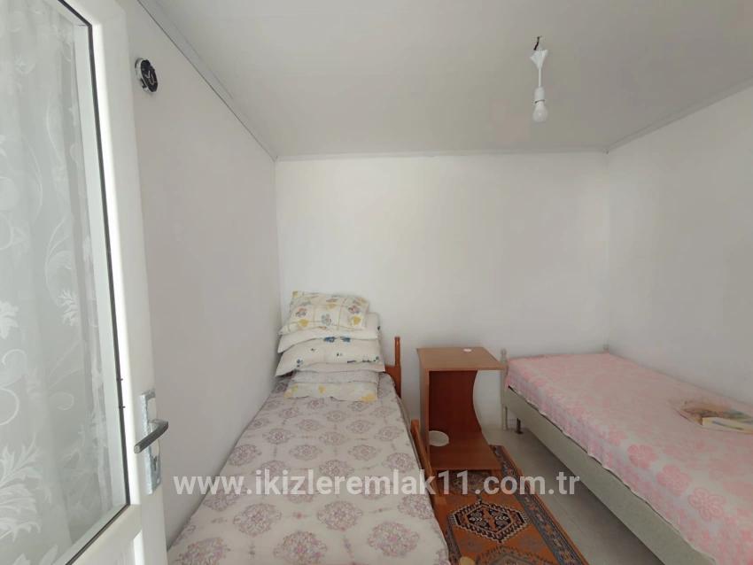 Для продажи Семейный дом 6+1 в Cumhuriyet Seferihisar Doğanbey - 200 m²