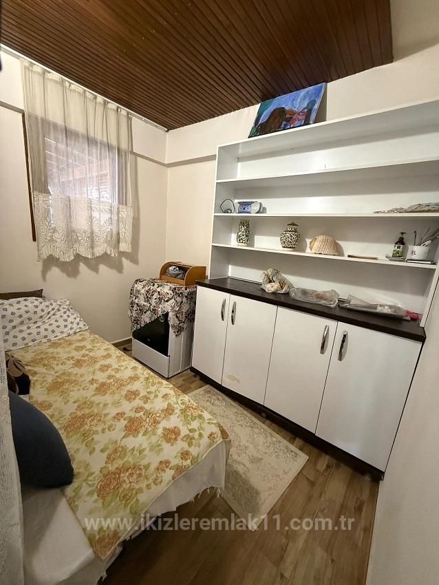 Квартира 2+1 На Первом Этаже С Садом На Продажу В Центре Сеферихисар Юрмез.