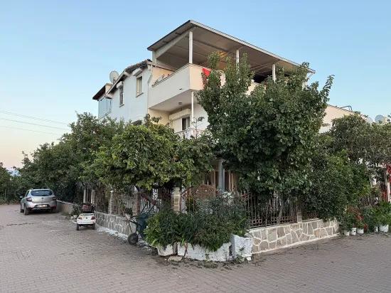 в Ürkmez внутри комплекса с бассейном 4+1 угловой дом, в 400 м от моря