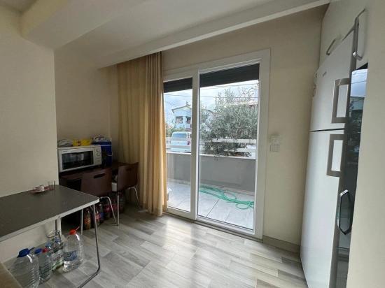 Продается Квартира 2+1 На Первом Этаже В Районе Сеферихисар-доганбей, В 200 М От Моря