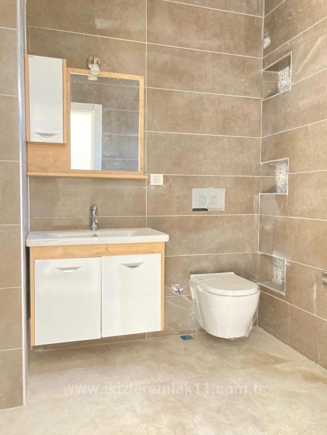 Seferihisar Doğanbeyde Satılık 2+1 Deniz Manzaralı Bahçeli Villa