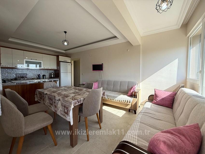 Gümüldür Merkezde Satılık 3 + 1 Deniz Ve Doğa Manzarali Yeni Daire