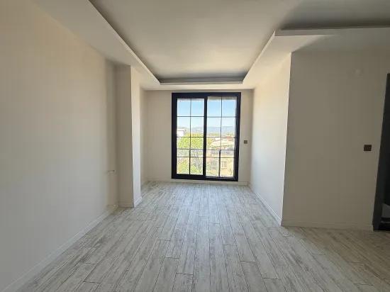Seferihisar Doğanbey'de Satılık 1+1 Deniz Tarafında Satılık Daire