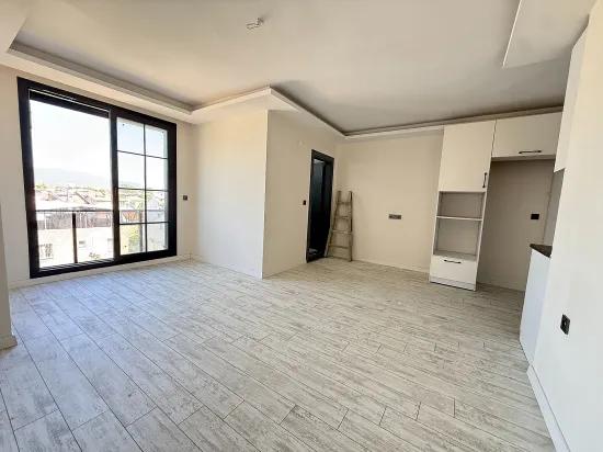 Seferihisar Doğanbey'de Satılık 1+1 Deniz Tarafında Satılık Daire