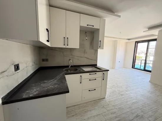 Seferihisar Doğanbey'de Satılık 1+1 Deniz Tarafında Satılık Daire