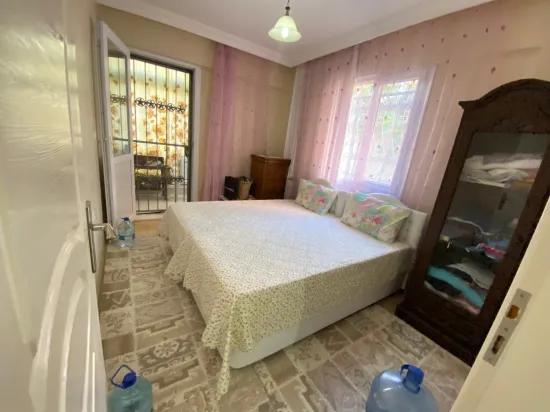 Ürkmez Merkez'de giriş katı 2+1 full eşyalı daire