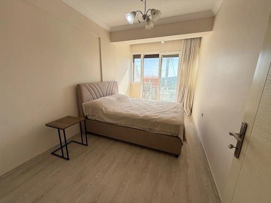 Gümüldür Merkezde Satılık 3 + 1 Deniz Ve Doğa Manzarali Yeni Daire