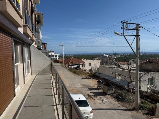 Gümüldür Merkezde Satılık 3 + 1 Deniz Ve Doğa Manzarali Yeni Daire