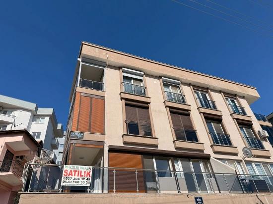 Gümüldür Merkezde Satılık 3 + 1 Deniz Ve Doğa Manzarali Yeni Daire