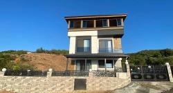 Seferihisar Doğanbey'de Satılık 3+1 Müstakil Deniz Manzaralı Havuzlu Villa