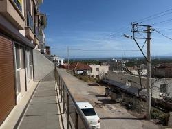 Gümüldür Merkezde Satılık 3 + 1 Deniz Ve Doğa Manzarali Yeni Daire